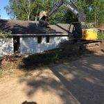 Tearing down a house to build a new one!