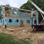 Framing the roof on a house and Torch Lake
