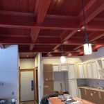 Installing coffered ceiling in the kitchen and dining area in a brand new home that we are building.