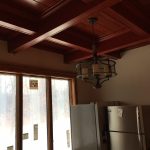 Installing coffered ceiling in the kitchen and dining area in a brand new home that we are building.