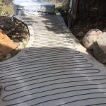 Installing snowmelt tubing for a warm walk to the hot tub. Installing snowmelt tubing for a warm walk to the hot tub.
