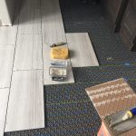 Installing heated floor in master bath.